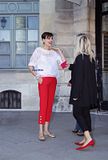 Ines de la Fressange in white and red